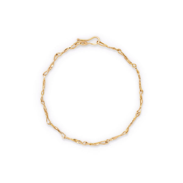 18k yellow gold hammered chain bracelet with hook clasp.
