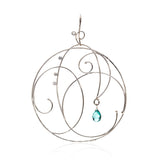 18k white gold "La Plage" earrings with natural blue tourmalines and diamonds.
