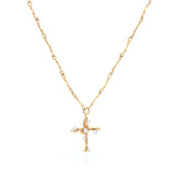 18k yellow gold small vine cross with white diamonds.