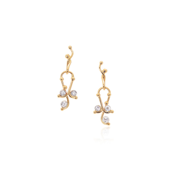 18k yellow gold small paisley earring with diamonds.