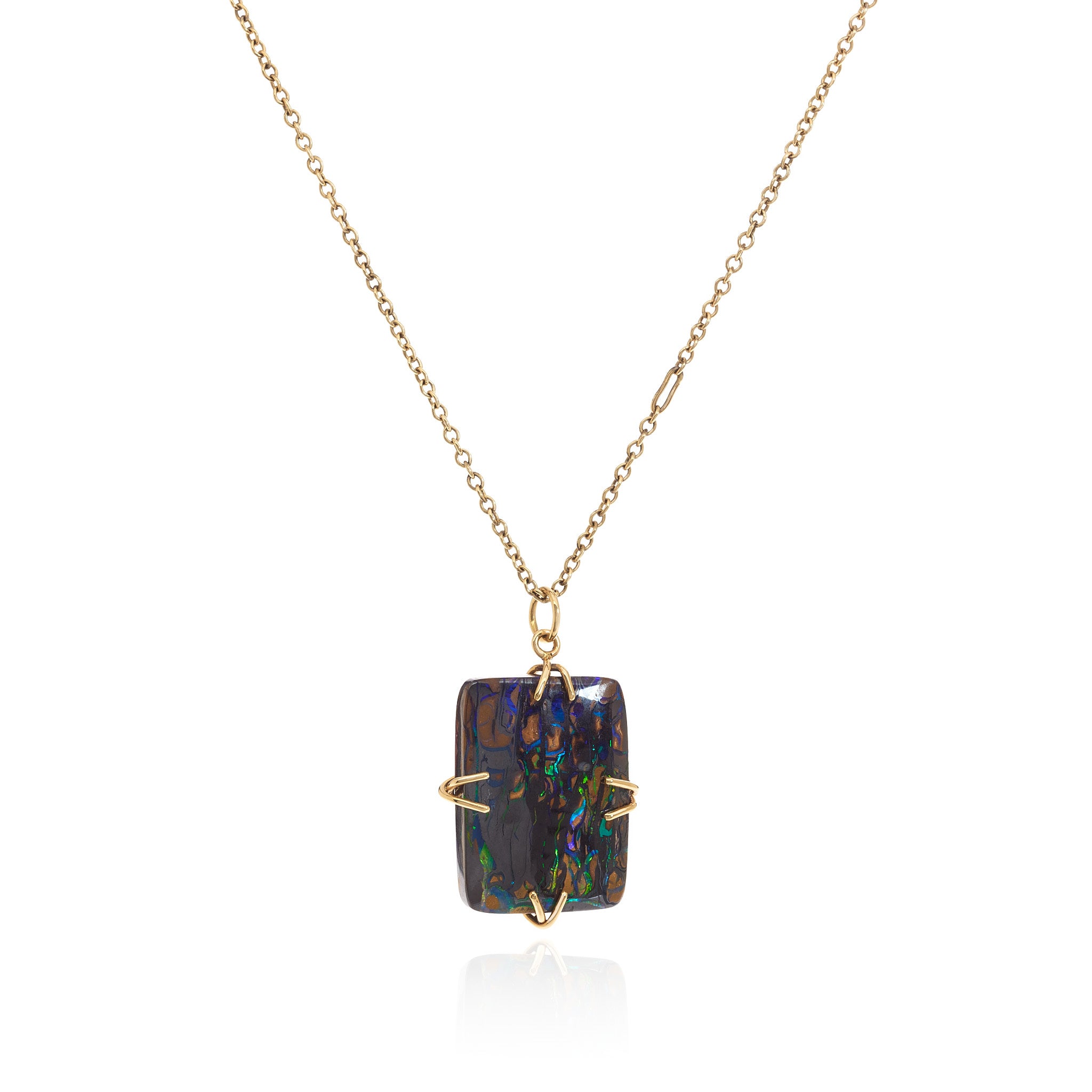 Boulder opal cushion cut pendant in an 18k yellow setting on a reclaimed antique finish chain.