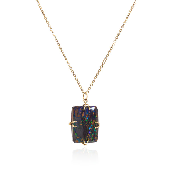 Boulder opal cushion cut pendant in an 18k yellow setting on a reclaimed antique finish chain.