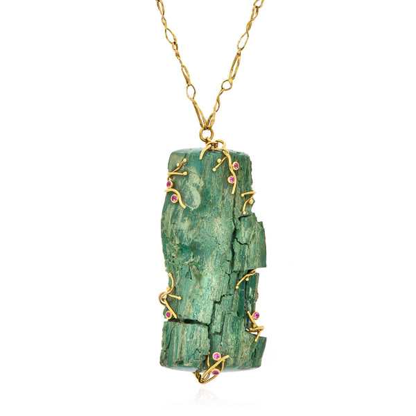 Green petrified wood pendant in 18k yellow gold with pink sapphires